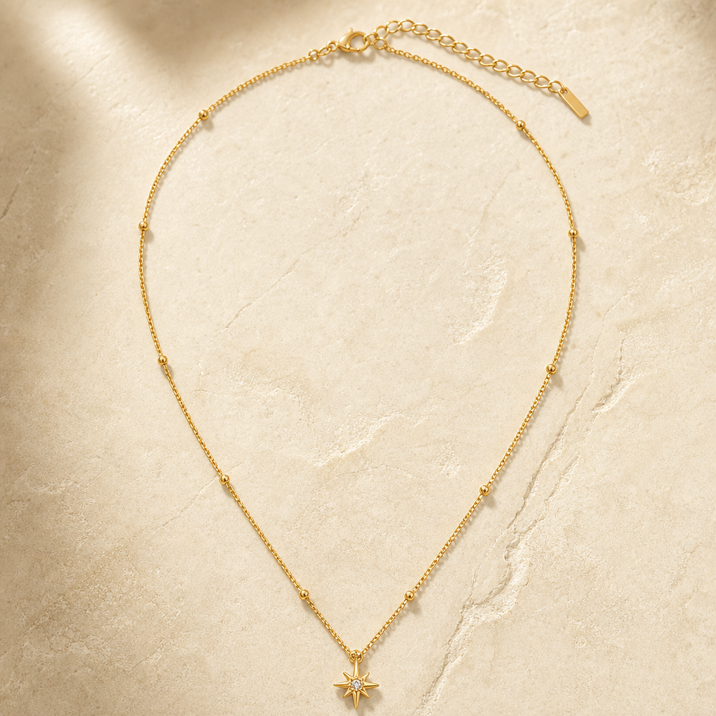18K Gold Plated Star Pendant Necklace With Zircon Hero Main showing a delicate gold-tone star pendant necklace.