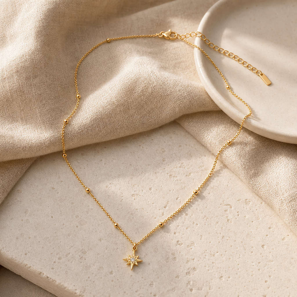18K Gold Plated Star Pendant Necklace With Zircon Hero Support A showing a delicate gold-tone star pendant necklace.