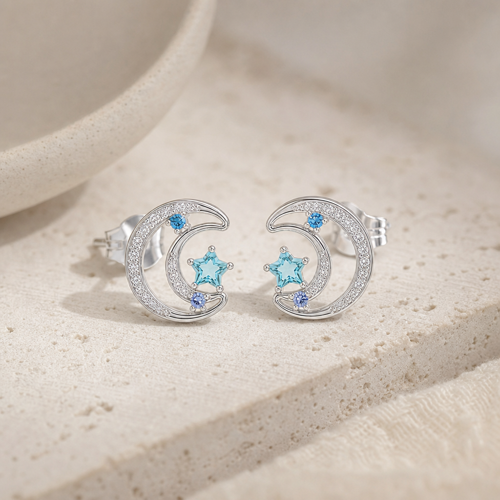 Blue Zircon Moon Star Stud Earrings Hero Support A product image featuring Blue Zircon.