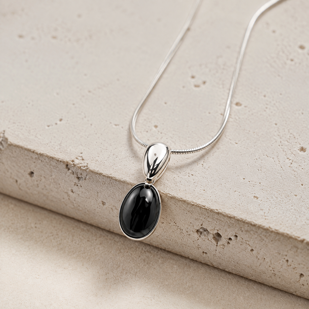 Black Onyx Silver Drop Pendant Necklace Hero Support A product image featuring Black Onyx.