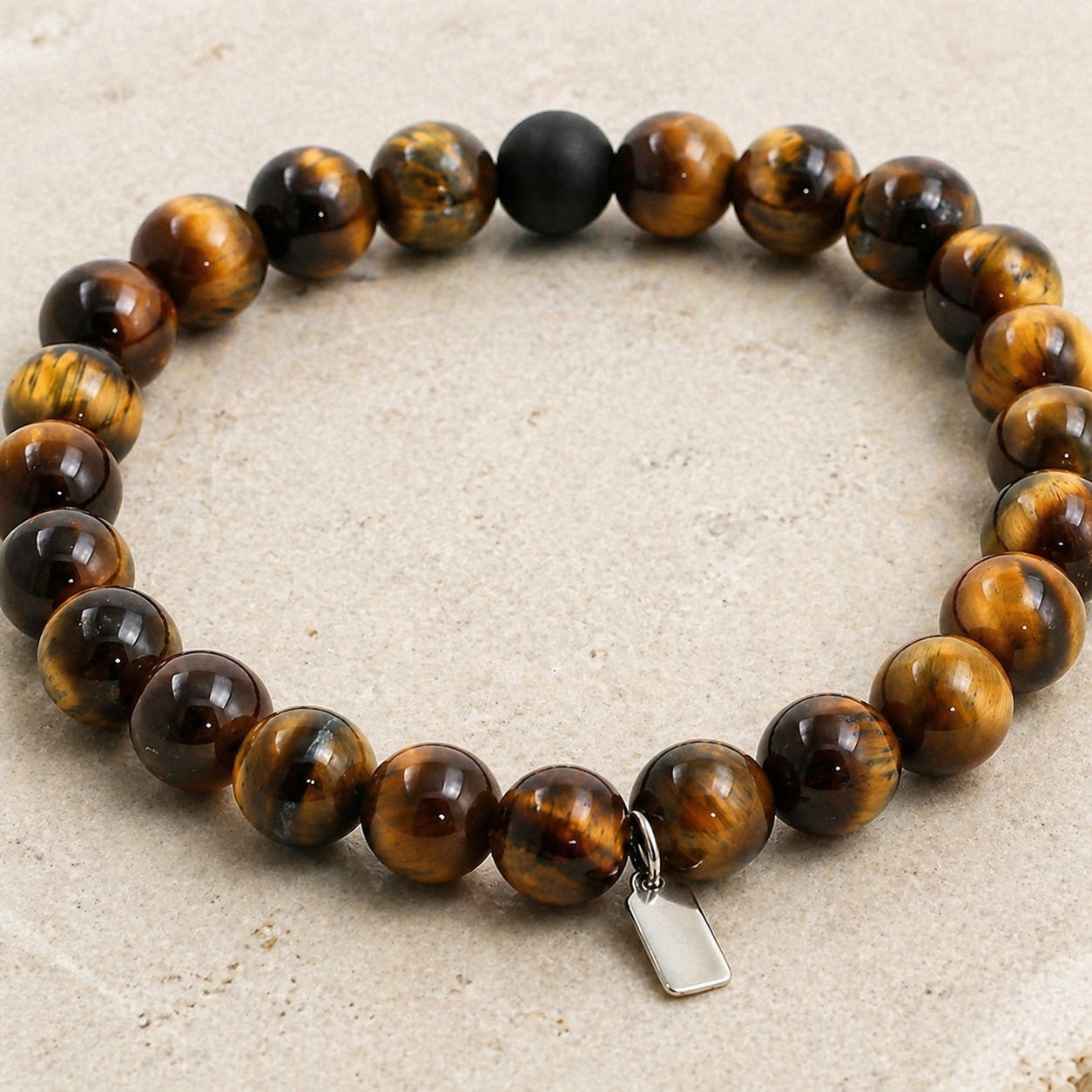 Tiger Eye & Matte Black Onyx Bracelet Macro Detail product image featuring Tiger Eye.