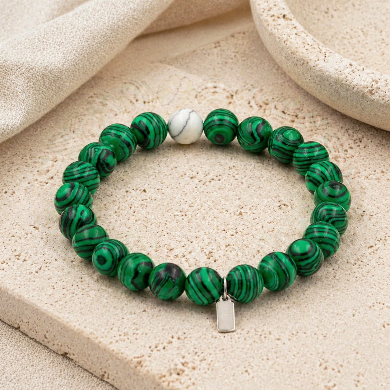 Malachite & Howlite 8mm Bead Bracelet Editorial Flatlay product image featuring Malachite.