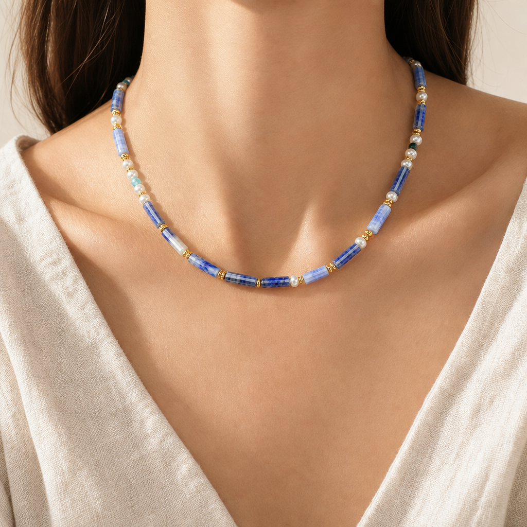 Blue chalcedony and freshwater pearl necklace worn as a light everyday necklace.