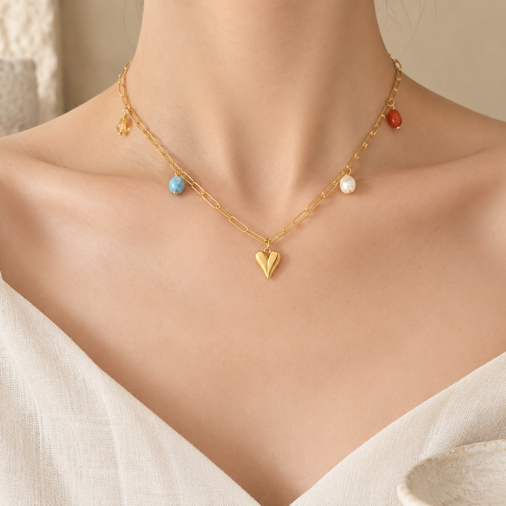 Titanium Steel Heart Pendant Necklace Story Lifestyle product image featuring Freshwater Pearl.