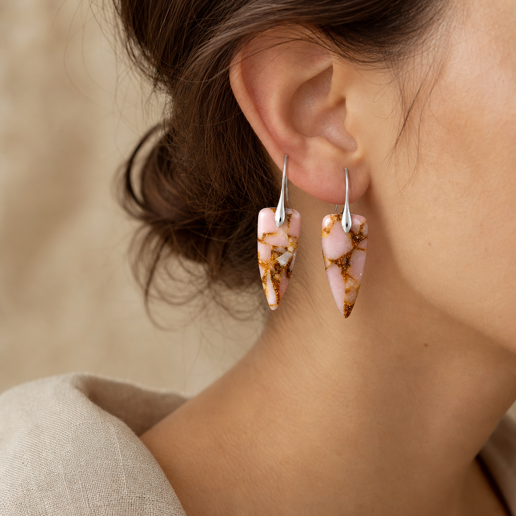 Silver Coral Natural Stone Geometric Earrings Story Lifestyle showing soft coral natural stone drops with silver-tone hooks.