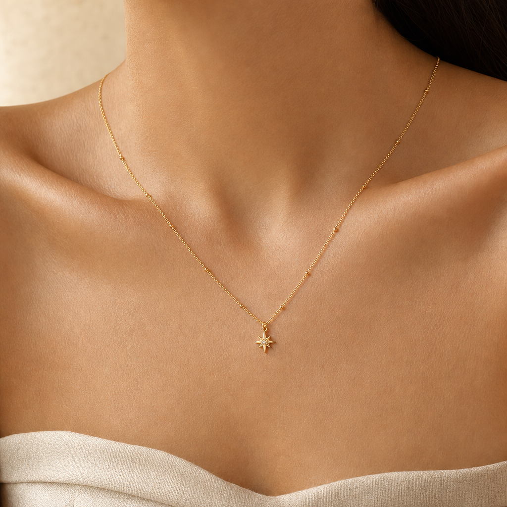 18K Gold Plated Star Pendant Necklace With Zircon Story Lifestyle showing a delicate gold-tone star pendant necklace.