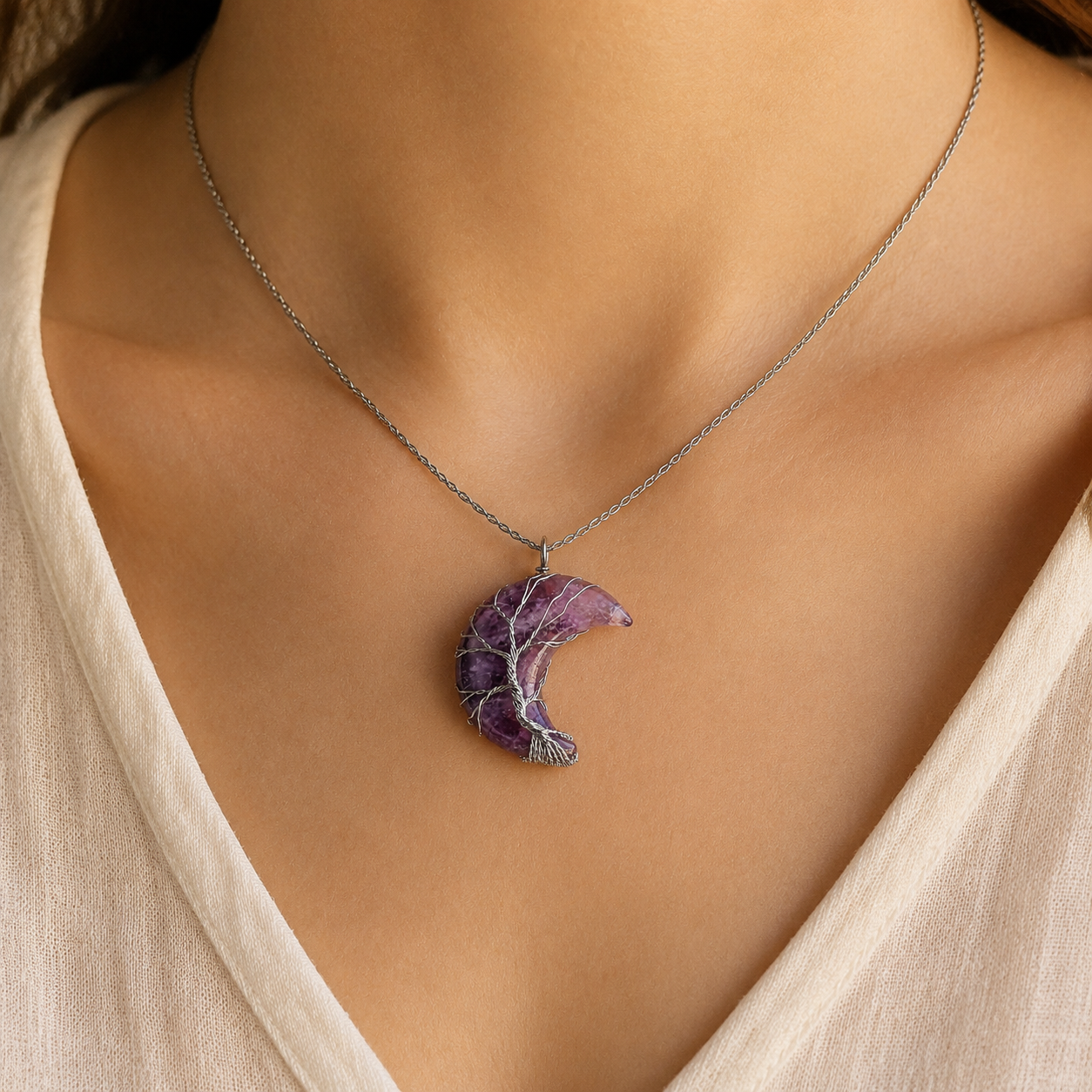 Amethyst Moon Tree of Life Necklace worn at the neckline.