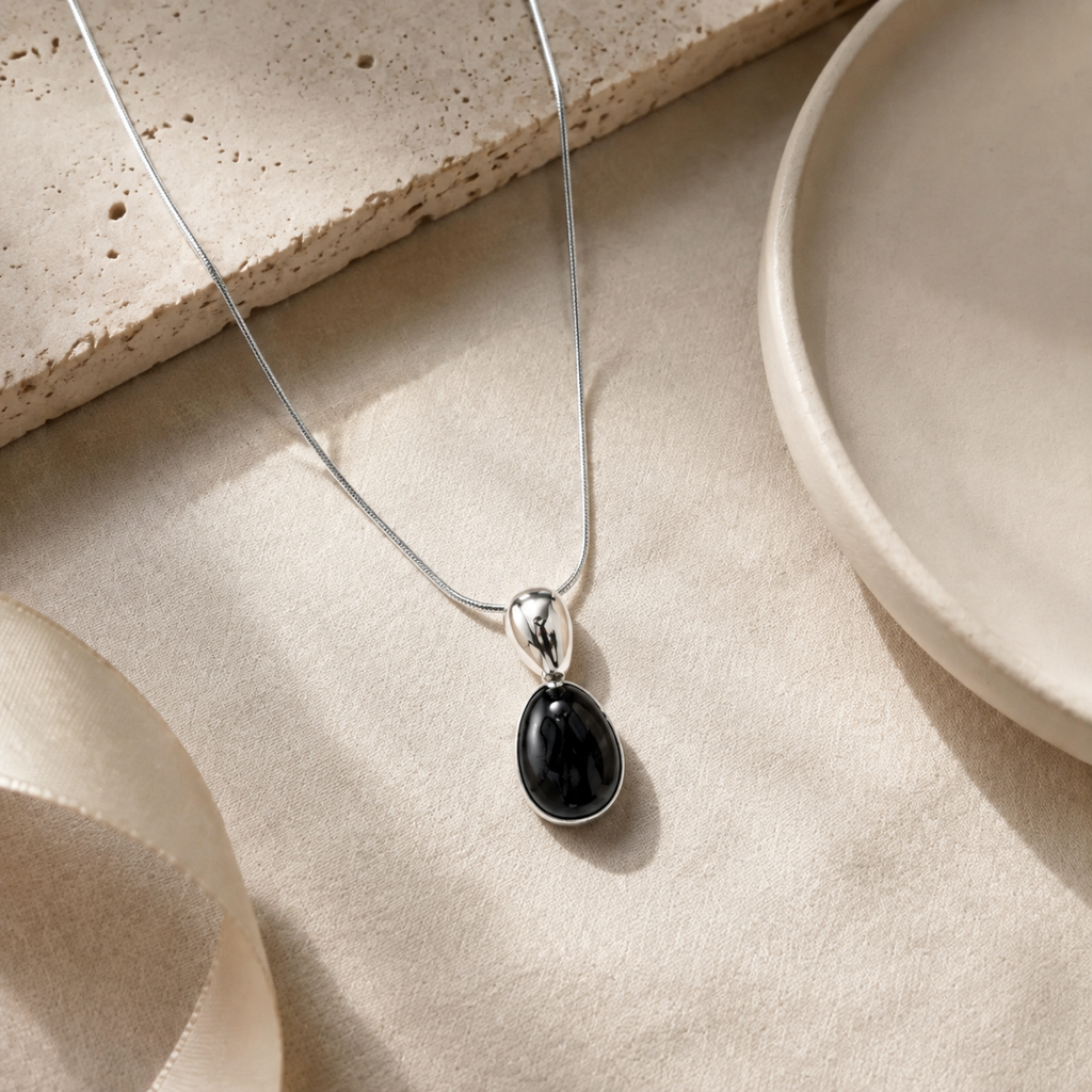 Black Onyx Silver Drop Pendant Necklace Story Mood product image featuring Black Onyx.